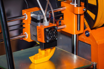 3d printer printing. Close up process of new printing technology