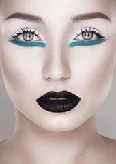 creative and futuristic look of fashion woman with green hair