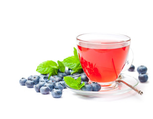 blueberry  tea with mint leaves on white background