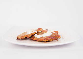 Potato Pancakes with cream and brown sugar
