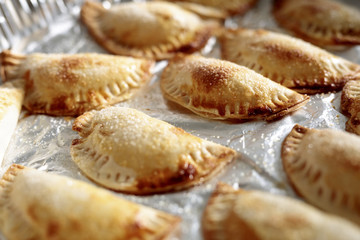 Pumpkin pies made by hand.