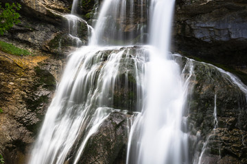 Fototapeta na wymiar Cascada de la Cueva waterfall in Ordesa valley Pyrenees Huesca S