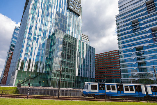 Tram at offices on the Zuid-as in Amsterdam Holland