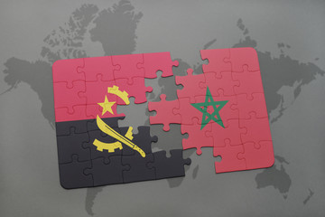 puzzle with the national flag of angola and morocco on a world map.