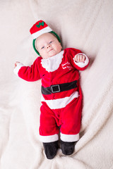 little baby celebrates Christmas