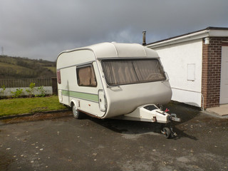 Mobile caravan parked on driveway