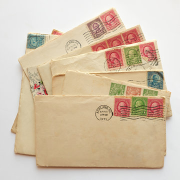 pile of old letters, envelopes post stamps