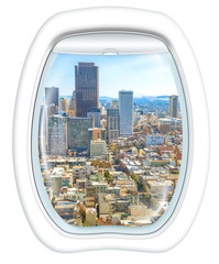 Fototapeta na wymiar Plane window on San Francisco Financial District Downtown, California, United States, from a plane through the porthole. Copy space.