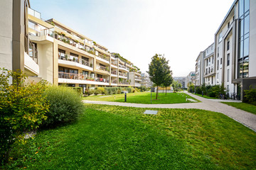 Apartment buildings in the city - Facades of new modern residential houses with low energy standard