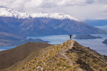 Girl stand on Roy's Peak, Wanaka, New Zealand
