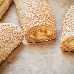 Homemade appetizers with cheese fillings. Cakes sprinkled with s