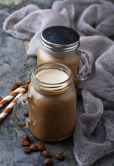 Obraz na płótnie Canvas Coffee with milk in jar