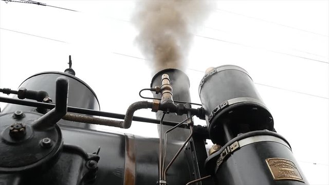 Historical steam engine train locomotive. old technology background. nostalgic retro vintage style.