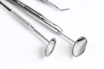 dental tools on white background top view