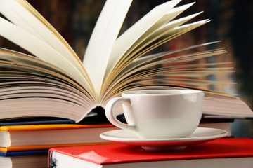 Composition with books and cup of coffee