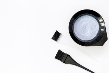 Tools for hair dye and hairdye top view white background