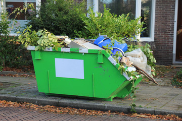 Loaded garbage dumpster