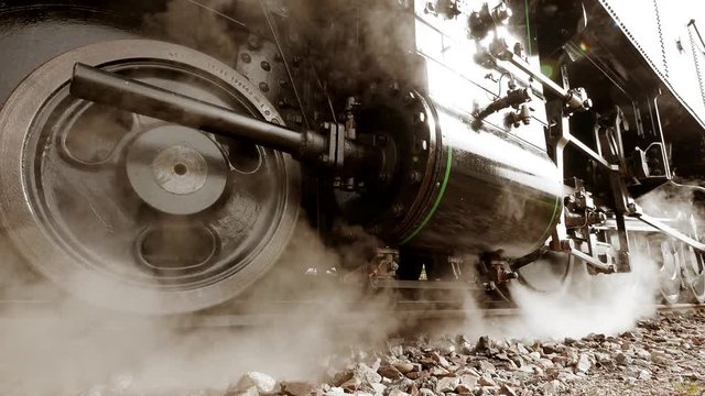 heavy steel wheel construction. old technology. steam engine train.