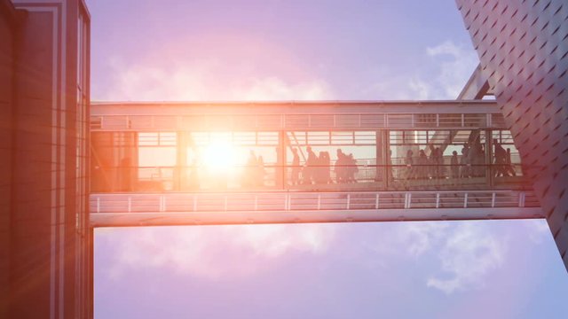 business people inside a modern glass building.