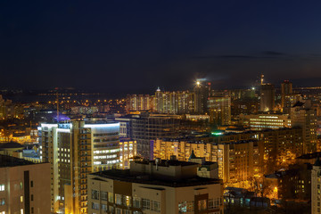 Fototapeta na wymiar mysterious dramatic night panorama cityscape view of Voronezh city