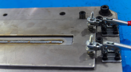 metal in the clamping device 