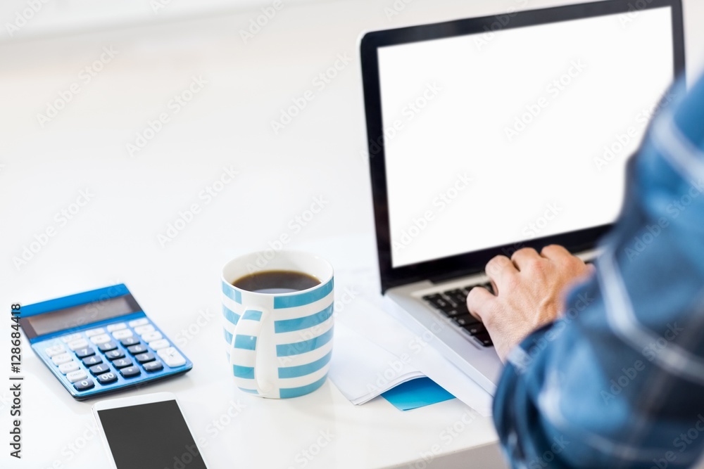 Poster mid-section of man using laptop