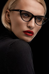 Fototapeta na wymiar Fashion Makeup Model With Red Lips And Black Eyeglasses Frame
