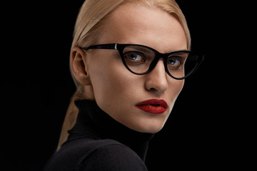Fototapeta na wymiar Woman Wearing Fashion Glasses. Female With Red Lips In Eyewear