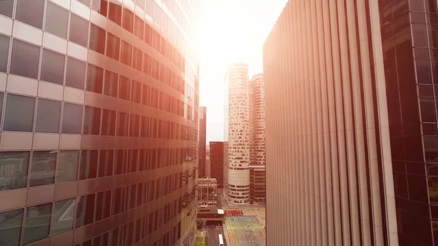 aerial view of city skyline at sunset.