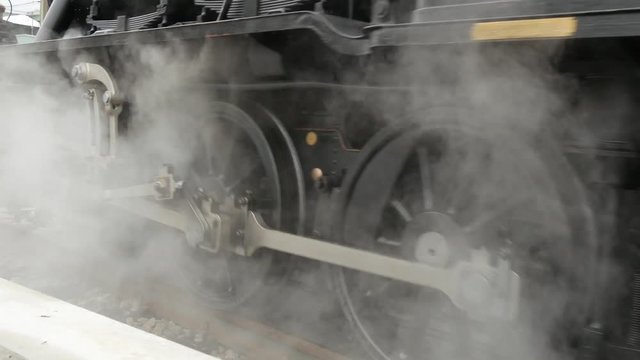 old fashioned public transport background. steam smoke locomotive.