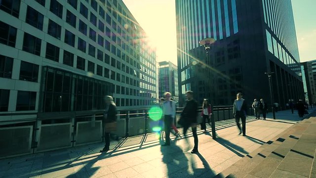 business people walking. modern buildings background.