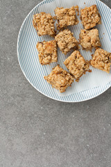 Raisin bars on a dark gray background 