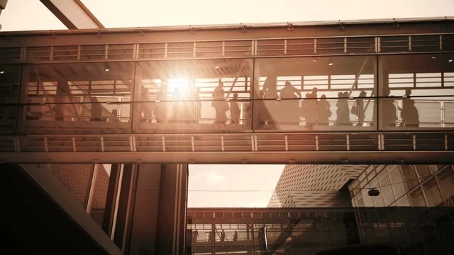 business people inside a modern glass building.