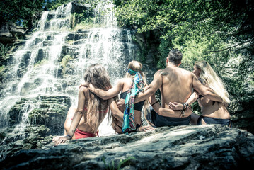 Fototapeta na wymiar Friends spending time at the waterfalls