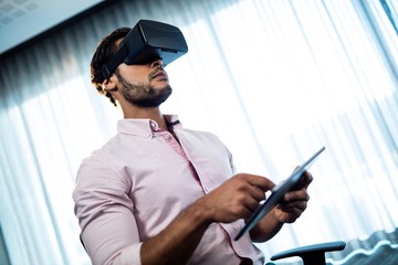 Businessman using an oculus