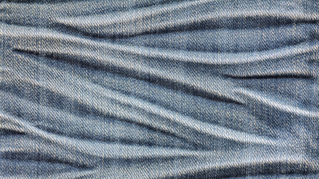 Denim jeans texture, denim jeans background. Old grunge vintage denim jeans. Stitched texture denim jeans background of jeans fashion design.