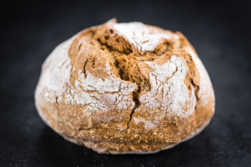 Rustic slate slab with Wholemeal Bun (selective focus)