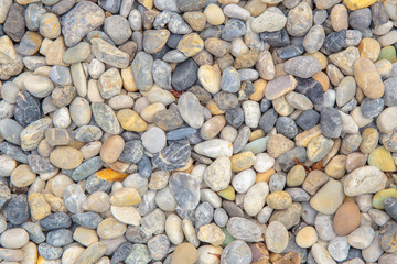 Colorful small pebbles or stone in garden with difference color.