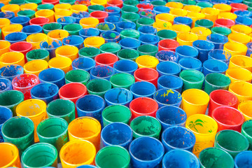 Colorful painted glass or bottle for artist.