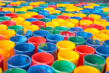 Colorful painted glass or bottle for artist.