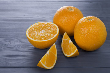 fresh orange fruit on wooden table