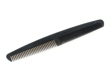 black plastic comb isolated on white background
