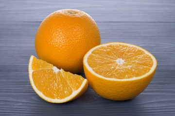 fresh orange fruit on wooden table