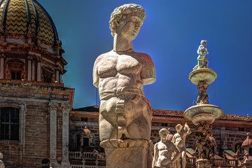 Fototapeta na wymiar Beautiful sculpture of the famous fountain of shame on baroque Piazza Pretoria, Palermo, Sicily, Italy