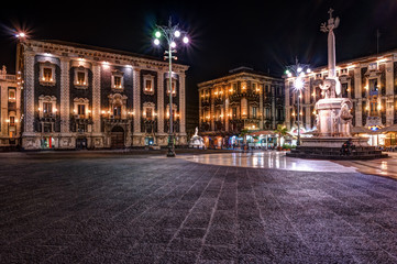 Night view of the Piazza del Duomo with the statue of the Elephant and the cathedral of Santa Agatha in Catania, Sicily, Italy.