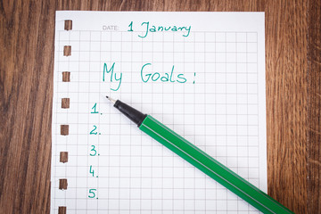 Pen and notebook for planning new years resolutions and goals