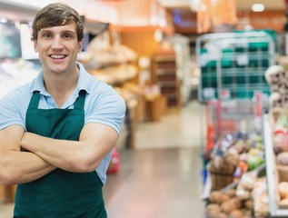 Portrait of man grocer smiling