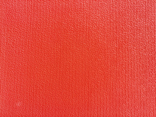 Closeup surface red rubber board textured background