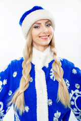 Portrait of a Snow Maiden in a blue suit. Beautiful white girl with long blond hair braided in pigtails. She smiles. Face makeup. Isolated on white background.