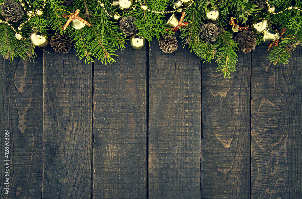 Wall mural frame from decorated christmas tree on rustic wooden background